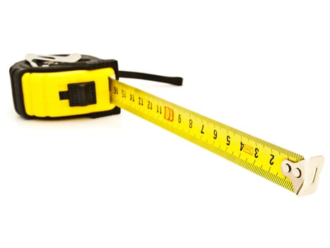 Photo of  yellow tapeline against the white background 