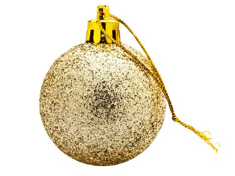 Bright golden New Year toy against white background