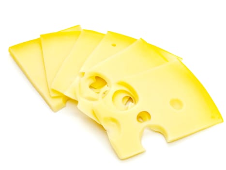photo of the tasty yellow pieces of cheese against the white background