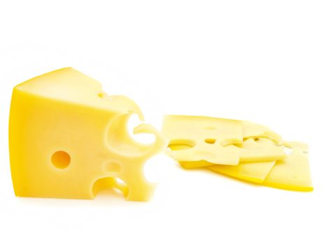 close up photo of the yellow piece of cheese against the white background