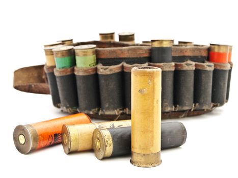 old cartridge for hunting rifle against white background