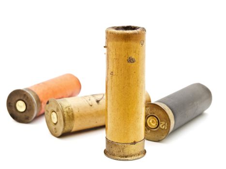 old cartridge for hunting rifle against white background
