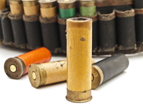 Some old cartridge for hunting rifle at white 