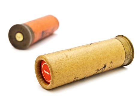 Photo of two old cartridge for hunting rifle against white background