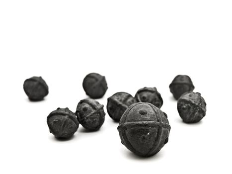 scattered lead shot for hunting against white background