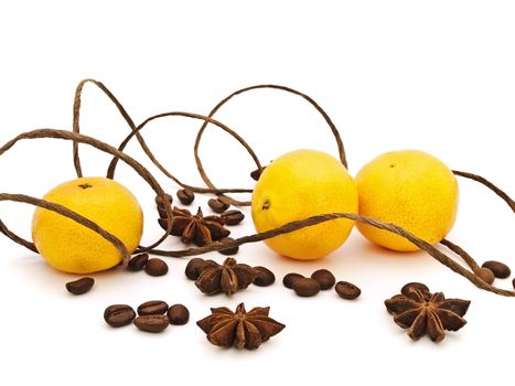 mandarines with decorations of anise stars, coffie and cord