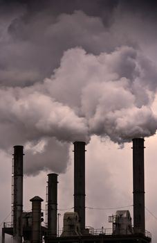 Fumes coming out of factory chimneys