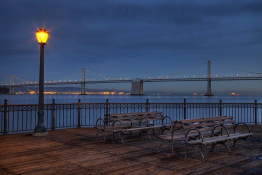 San Francisco at night - Bay Bridge and harbour from Pier 7