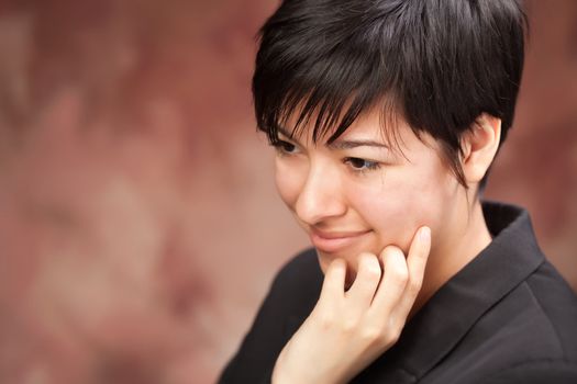 Multiethnic Girl Poses for a Studio Portrait.