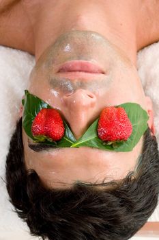 A man enjoys a fruit acid peel