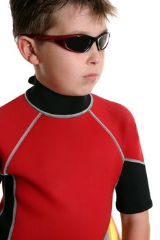 Surfer boy wearing a wetsuit and sunglasses.