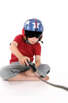 An attentive child engrossed playing a flight simulator game