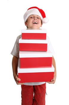 A merry boy with a stack of gift boxes.
