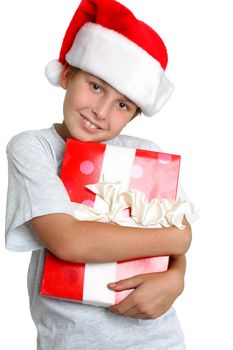 Young child holding a Christmas present