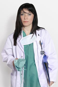 Female Surgeon in green scrubs