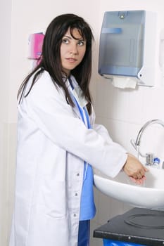 Doctor washing her hands

