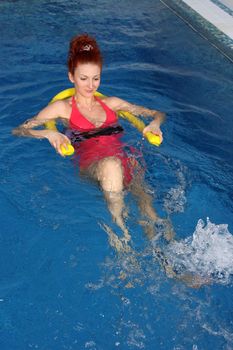 Employment with the pregnant woman in pool
