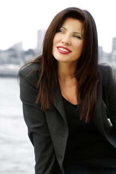 Businesswoman in grey pinstripe suit