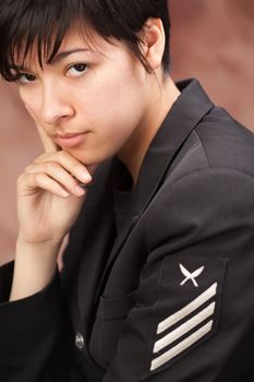 Multiethnic Girl Poses for a Studio Portrait.