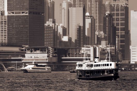 Famous landmark of Hong Kong ferry sailing on Victoria Harbor, Asia.
