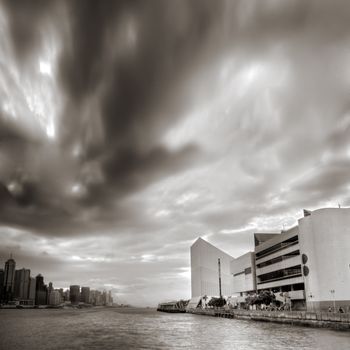 city scenes with clouds movement near harbor in Hong Kong.