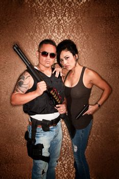 Glamorous Undercover Cops or Criminals with Shotgun and other Firearms