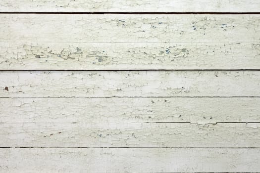 the background of weathered white painted wood