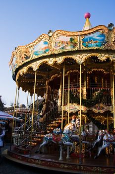 Merry-go round on fair on cold winterday - vertical image