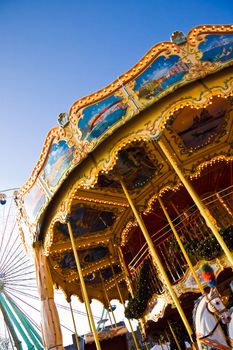 Merry-go round on fair on cold winterday - vertical image