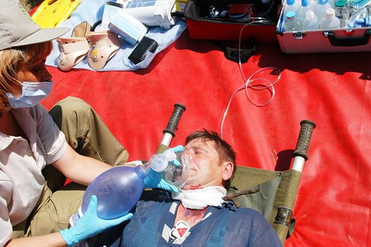 KYIV REGION, UKRAINE - MAY 24, : surgeons in operative room in military mobile hospital during a medical military trainings on May 24, 2007 in Kyiv region, Ukraine