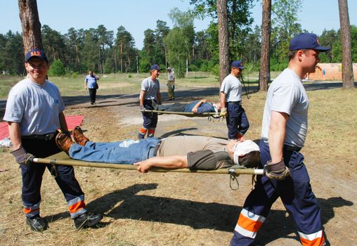 KYIV REGION, UKRAINE - MAY 24, : surgeons in operative room in military mobile hospital during a medical military trainings on May 24, 2007 in Kyiv region, Ukraine