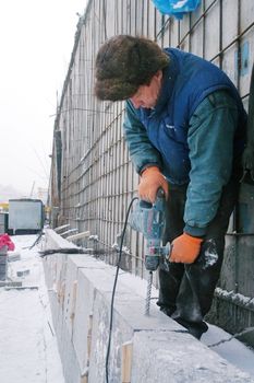 KYIV, UKRAINE -JANUARY 31: Worker at  construction site of Podolsko-Voskresensky bridge during open doors day on January 31, 2007 in Kyiv, Ukraine