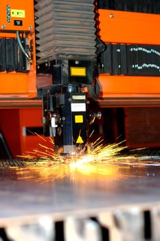 Industrial laser with sparks flying around