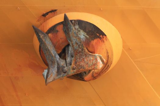 A giant rusty anchor of a massive ship