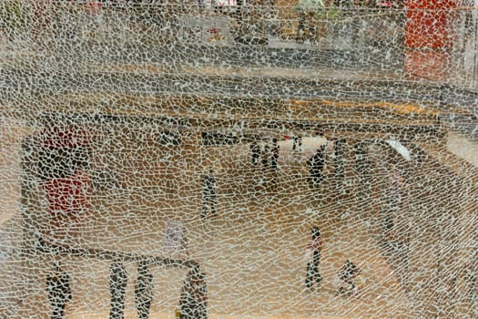 View through broken glass in shopping center