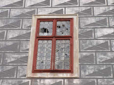 ancient window, consisting of rounds, the building of museum in Ceska Lipa, Czech republic