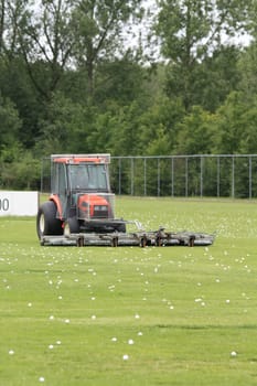 ballpicker, A special vehicle to collect golfballs from the driving range of a golfclub