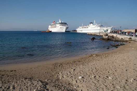 Aegean Sea. Port. Snow-white ships, boundless expanse of water is a journey into the world of Greek mythology.