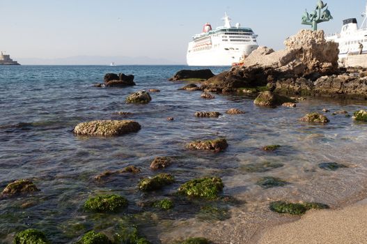 Aegean Sea. Port. Snow-white ships, boundless expanse of water is a journey into the world of Greek mythology.