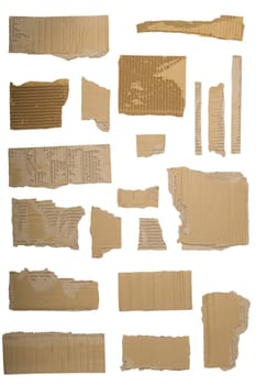 Pieces of torn brown corrugated cardboard, Isolated on White Background