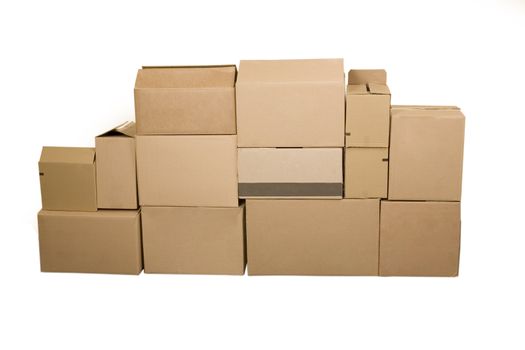 Brown different cardboard boxes arranged in stack