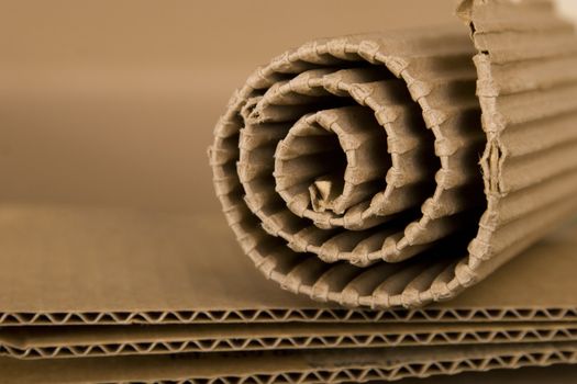 close-up of spiral made from brown cardboard