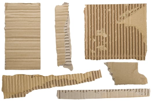 Pieces of torn brown corrugated cardboard, Isolated on White Background