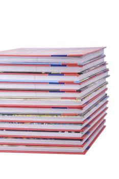 color tower books on white background arranged in stack