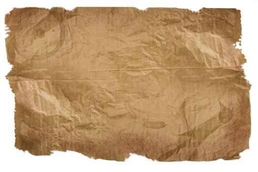 Piece of brown paper, torn on white background