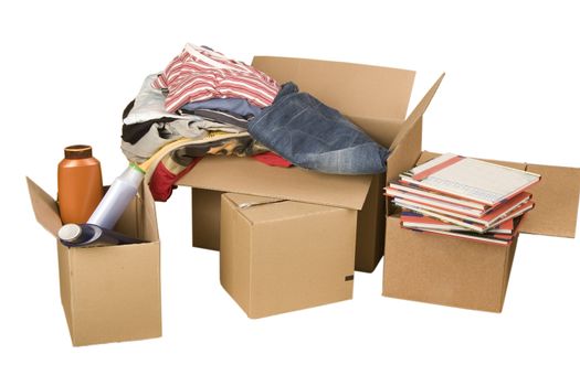 transport cardboard boxes with books and clothes on white background