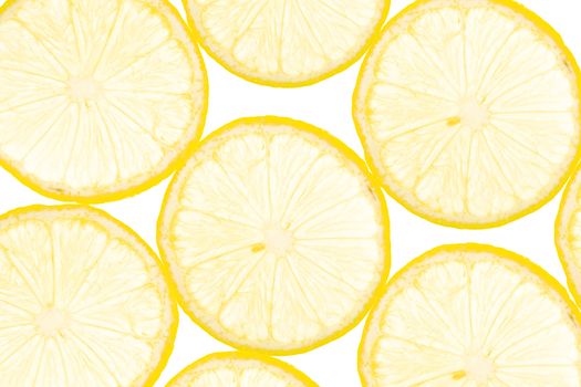 slice of fresh yellow lemon, background and organic texture