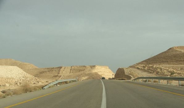 A view of an empty highway road .