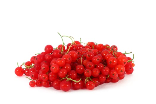 Heap of red currants, isolated on white background
