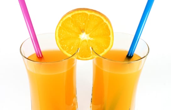 Two glasses of fresh orange juice isolated on white